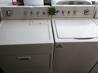A white set of Kitchen Aide washer and dryer