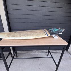 5’11 thruster/quad surfboard