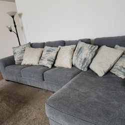 L Shaped Couch with Pillows 