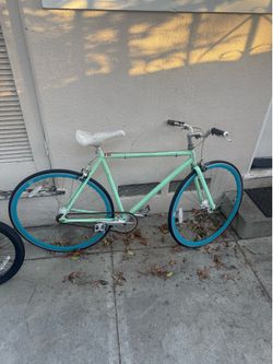 Mint green “fixie” bicycle