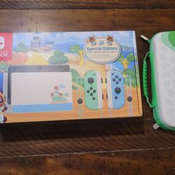 Nintendo Switch - Animal Crossing: New Horizons Edition - With Zelda Game, and Digital Mario Cart Game Inside. And Carrying Case.