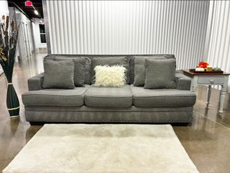 Ashley Furniture Signature By Design Sofa With Accent Nailhead Trim Including Delivery and Matching Pillows