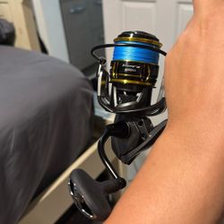 Okuma Inspira 4000 On a tsunami Carbon Shield lll Medium Light