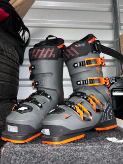 +1                    These are K2 Recon 130 LV ski boots, featuring a grey and orange color scheme