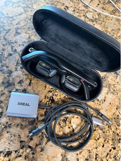 Xreal one Pro’s AR glasses with Xreal power adapter