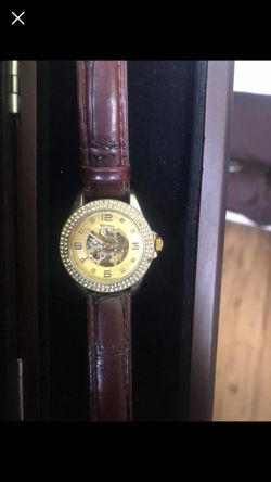 Wind up moving parts rhinestone watch