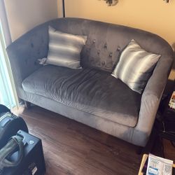 Loveseat with pillows 
