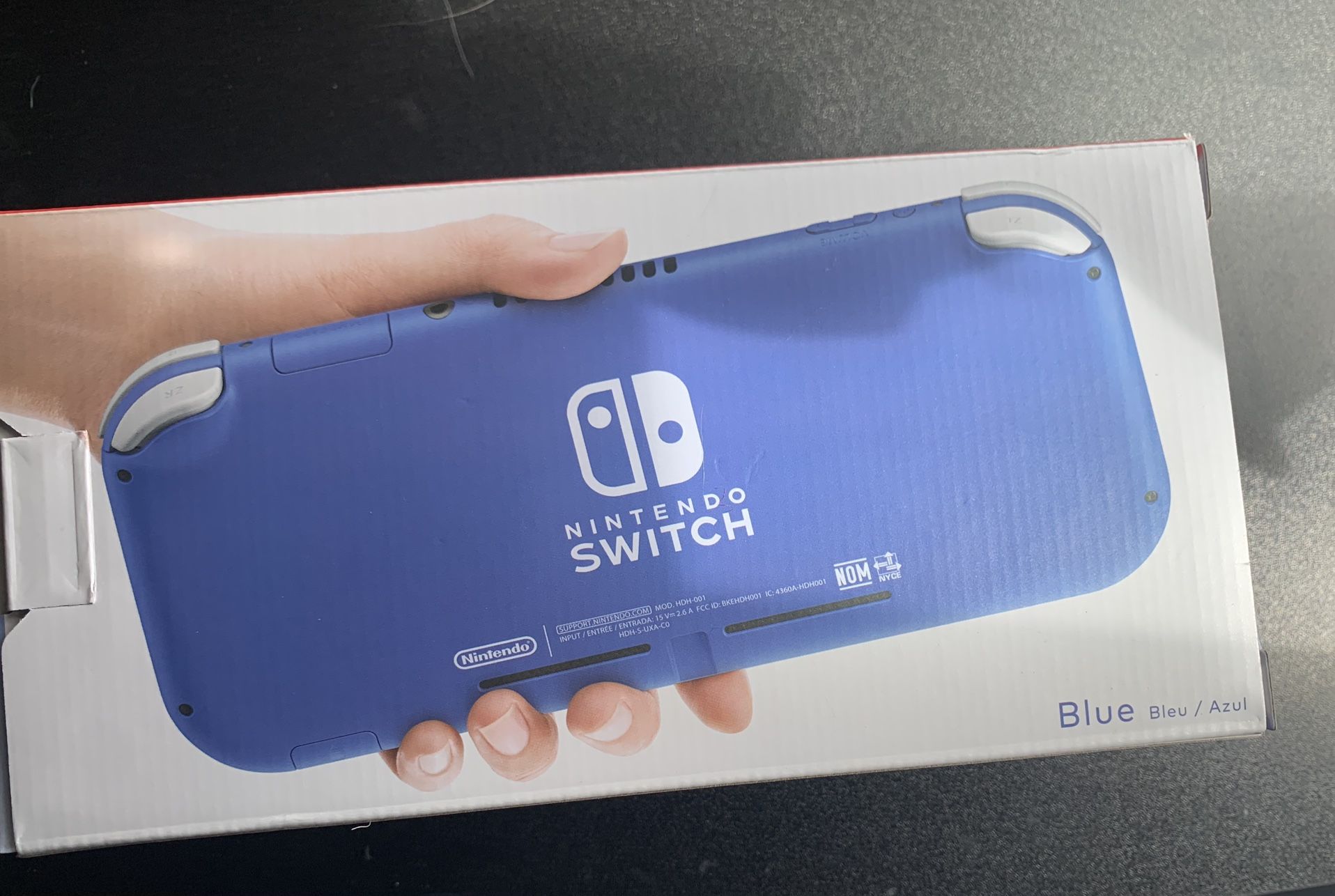 Dark Blue Nintendo Switch Lite And charger