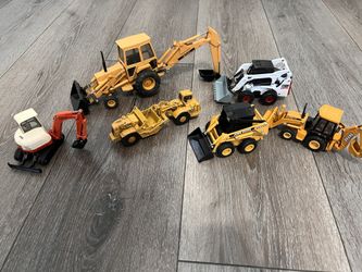 Diecast 1/32 scale ERTL Bobcats and construction backhoe loaders fully metal asking 50 dollars for all of them