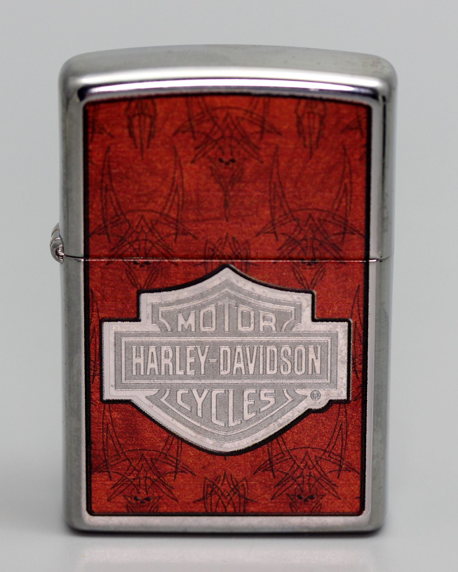 NEW IN BOX #28266 2007 ZIPPO LIGHTER HARLEY-DAVIDSON POLISH CHROME ORANGE SKULL SKETCHING