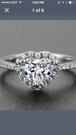 This heart shape Sterling SilverCubic Zirconia ring comes in size 8&9