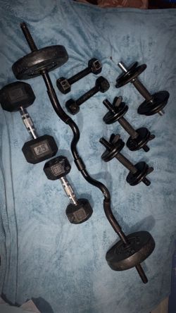 Weights  (11) 2.5 Lb (2) 7.5 lb    (2) 5 Lb (1) 15 Lb (1) Bar (4) Locks