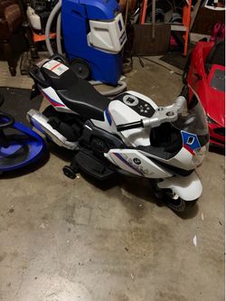Kids ride on motorcycle