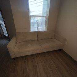 Beige 3 seater couch 