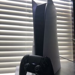Sony PlayStation 5 With A Black Controller 