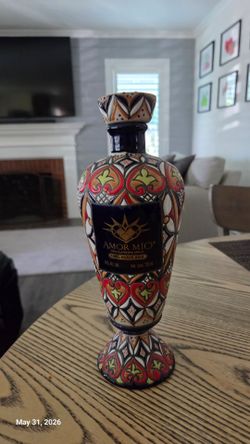 Amor Mio empty tequila bottle