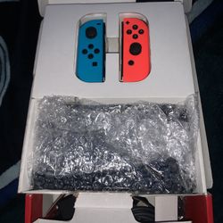Nintendo Switch With Neon Blue And Neon Red 