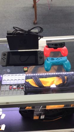 Nintendo  Switch Includes Dock Controller Attachments and Super Mario Bros Deluxe Game Factory Reset