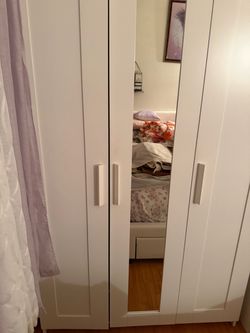 White three - door with full length mirror