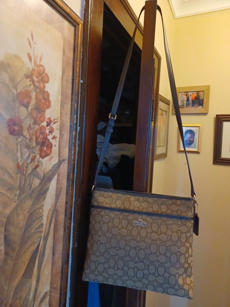 Beautiful Brown And Deep Beige Coach Purse. Approximately 10 Inches Tall By 11 Inches Wide. New! Never Used.