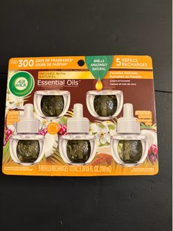 New Air Wick Essential Oils refills pack. Has 5 refills with Cherry & Coconut scent. Total 3.38 US fl oz. Provides up to 300 days of fragrance.