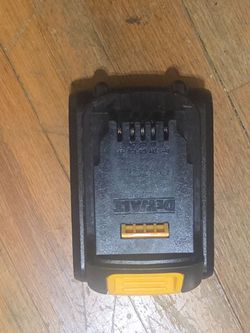 This is a DEWALT 20V MAX Lithium-Ion battery pack, likely a compact model such as the 2.0Ah (DCB203) or a similar 20V series.The battery features a du