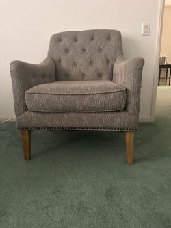 Free Gray upholstered chair with tinge of green