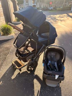 Uppa baby double stroller with car seat. / coche doble uppa babay con silla de carro