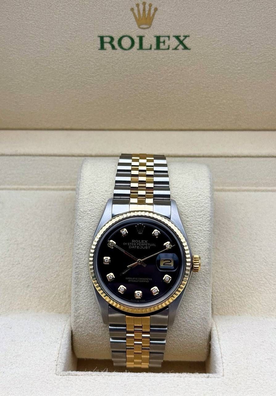 Rolex Datejust 36 36mm black diamond dial yellow gold and stainless steel jubilee bracelet box appraisal
