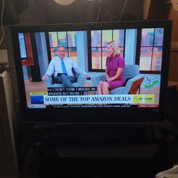 Sony 42 Inch  TV With Stain  And Remote 