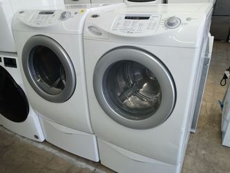 Maytag Neptune front load washer and dryer set on pedestals - Free delivery