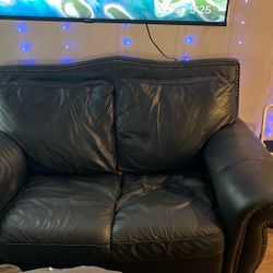 Dark Gray Leather Couch $100