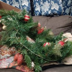 Big Beautiful Long Christmas Garland ,Has Red Pine Cones,and Bulbs