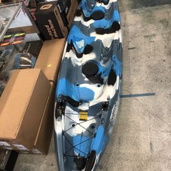 Two person kayak with paddles , backrests , hatches, rod holders and wheel