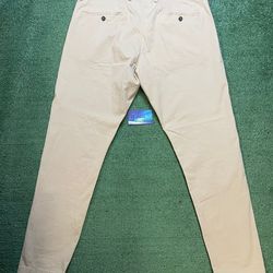 AMI Alexandre Mattiussi beige trousers