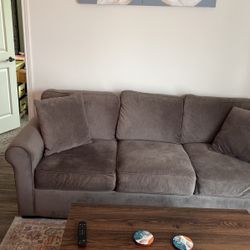 Gray three seat couch