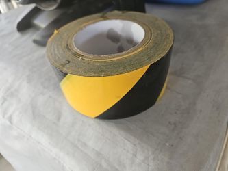 black and yellow warning tape。