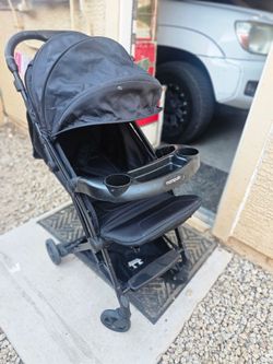 Mompush black stroller
