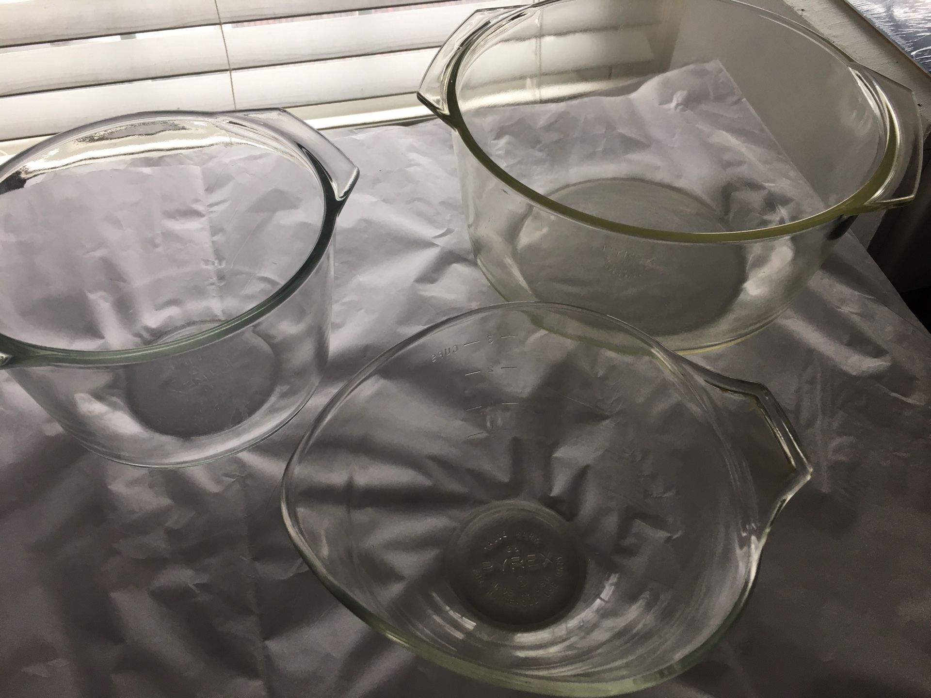 3 vintage Pyrex clear glass mixing bowls all for $60