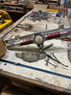 1950 Chrysler trunk latch and hood ornament