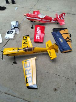 Two gas powered airplanes (with bag included)