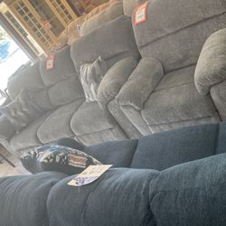Gray reclining couch and recliner chair, two pieces both four 1199