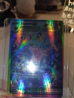 Pokemon cards and a Scarlet & Violet Charizard illustrated 24 cards all together.