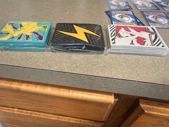 6 card Pokemon bundle. 3 pack of sleeves.