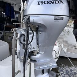 20 HP Honda Outboard & Remote Box