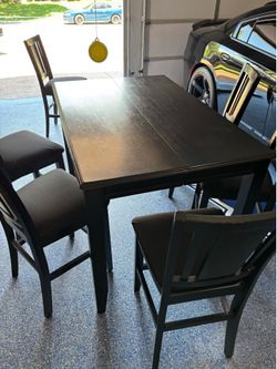 Used dining table with 6 chairs with center pc to make table longer
