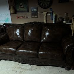 2 Brown leather Sofa $1000 . OBO!! 