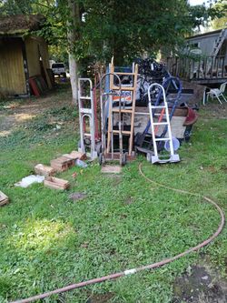 Four regular dollies two appliances and one that transforms into a cart