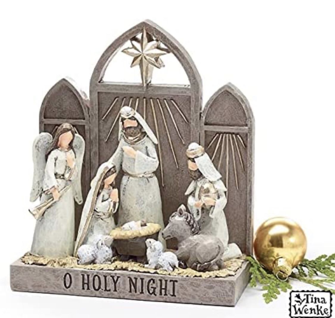 Stunning one piece shelf sitter depicting a nativity scene with "O Holy Night" recessed on the front. The trifold background has a gold star at the to