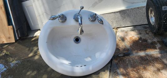 Free over mount vanity sink with faucets